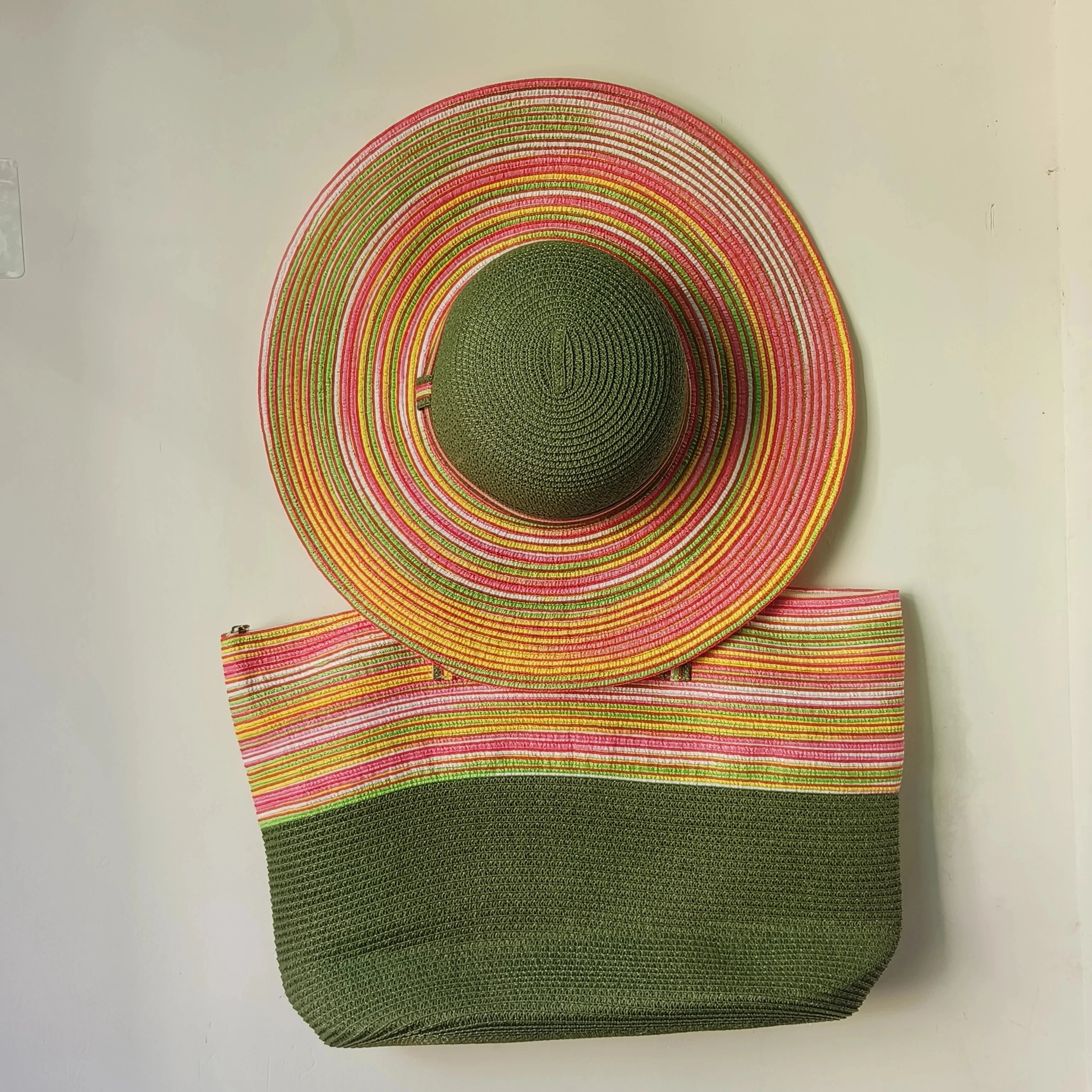 Straw hat and purple beach bag