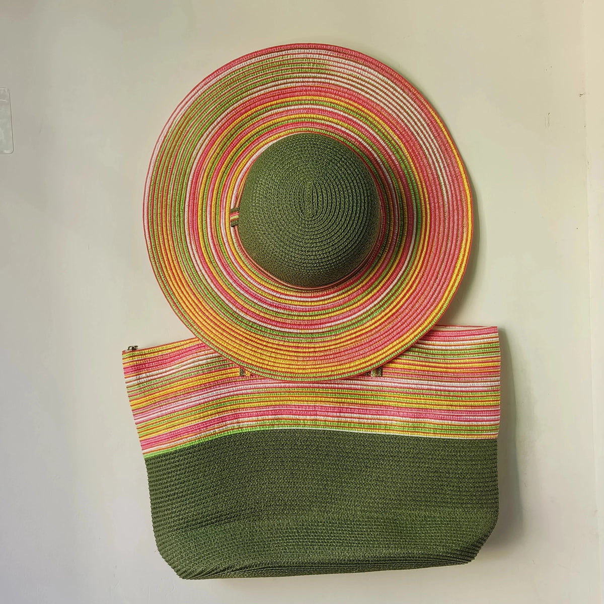 Straw hat and purple beach bag