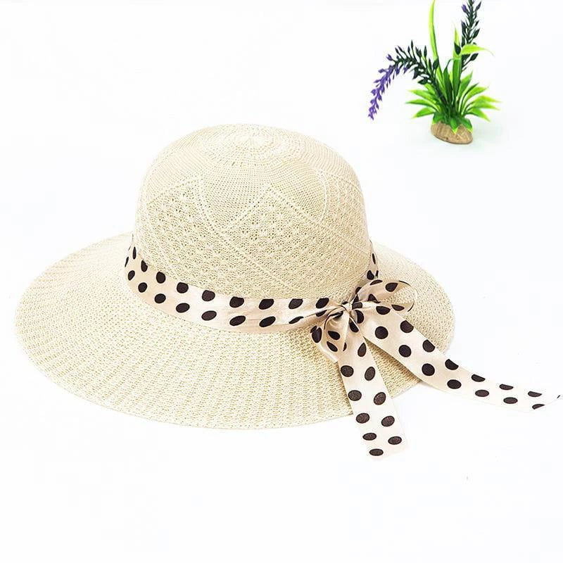 Straw hat with bow tie