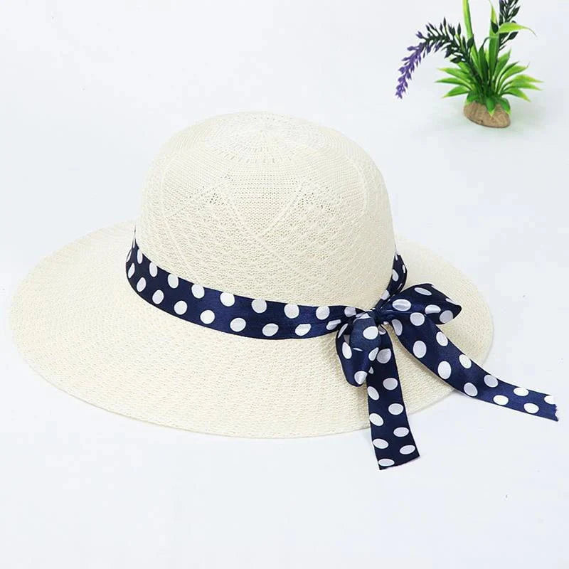 Straw hat with bow tie