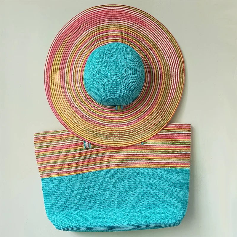 Straw hat and light blue beach bag