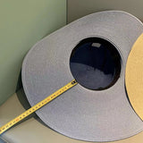 Large-brimmed straw hat