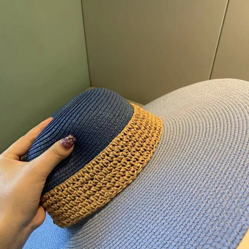Large-brimmed straw hat