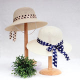 Straw hat with bow tie