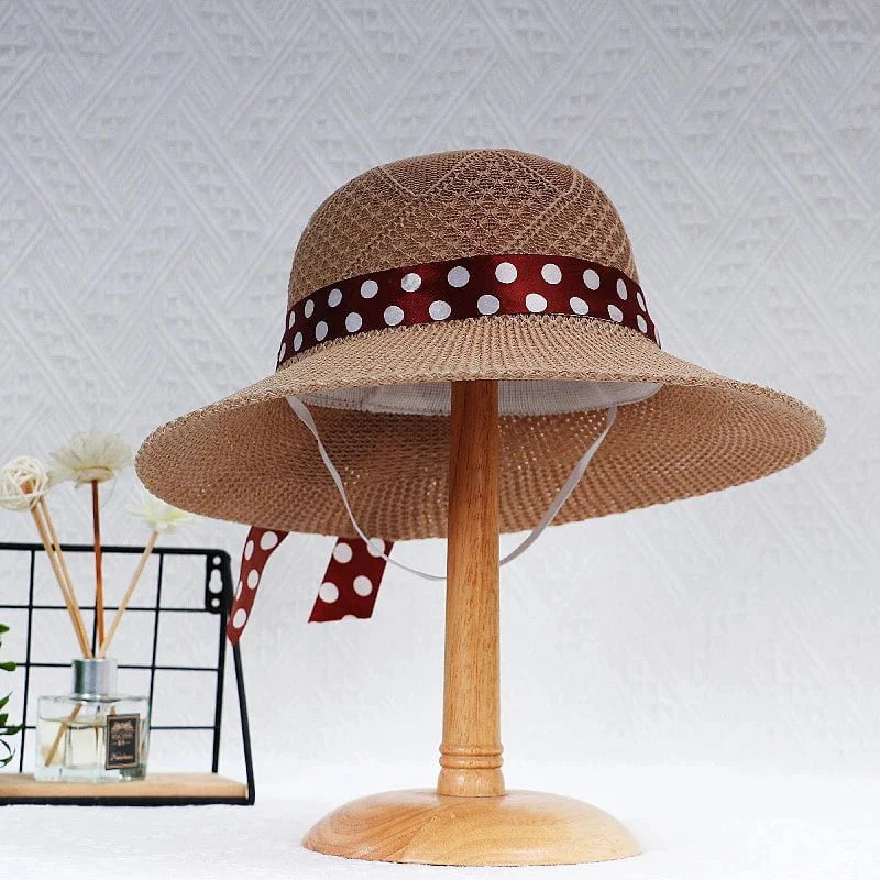 Straw hat with bow tie