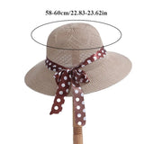 Straw hat with bow tie