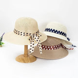 Straw hat with bow tie