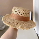 Flat straw hat