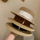 Beach straw hat with wide ribbon