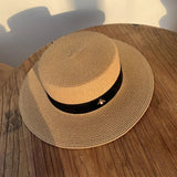 Round straw hats with flat brim