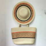Straw hat and khaki beach bag