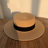 Round straw hats with flat brim