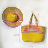 Straw hat and purple beach bag