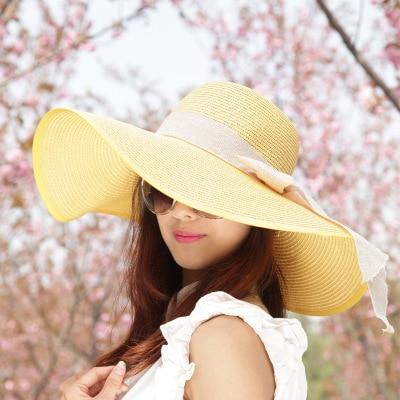 Straw hat with bow - Beach