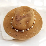 Straw and pearl hat